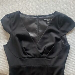 Perfect little black dress. Beautiful seam details at the bust, fitted bottom